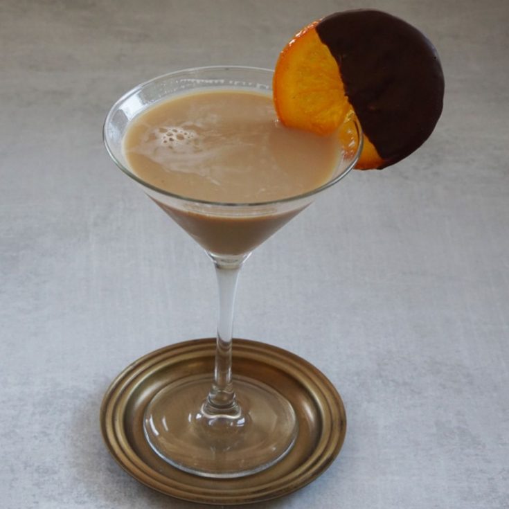Chocolate Orange Martini with a Chocolate Dipped Orange on the Rim