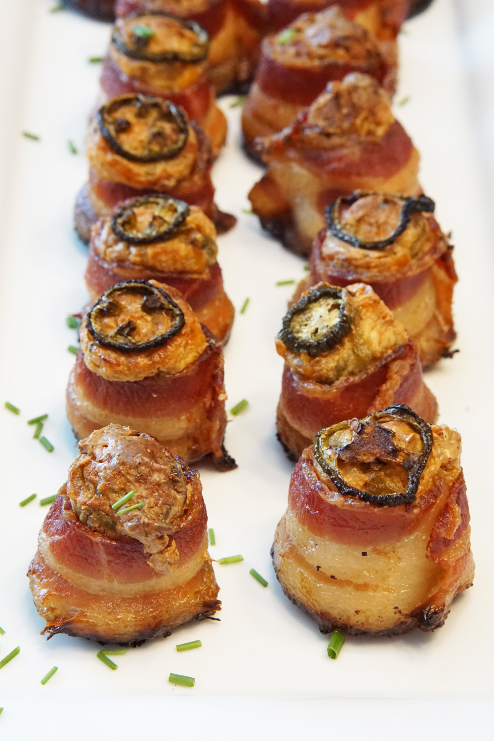 Bacon wrapped sausage with cream cheese filling