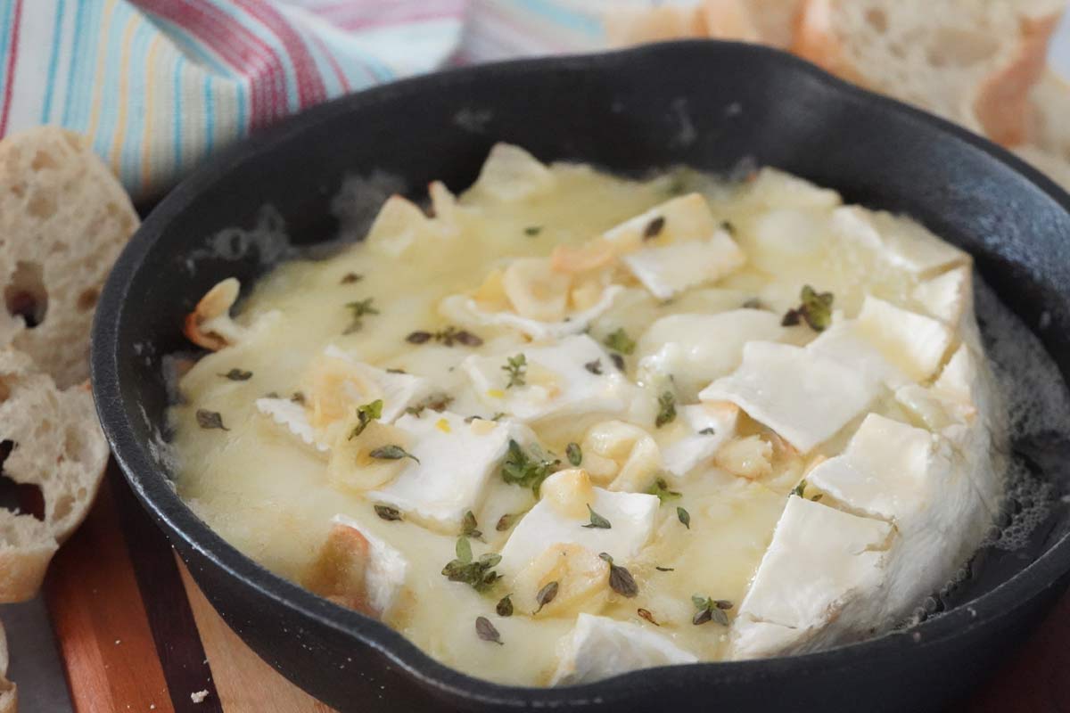 Garlic Butter Baked Brie That's the Perfect Appetizer - Savored Sips