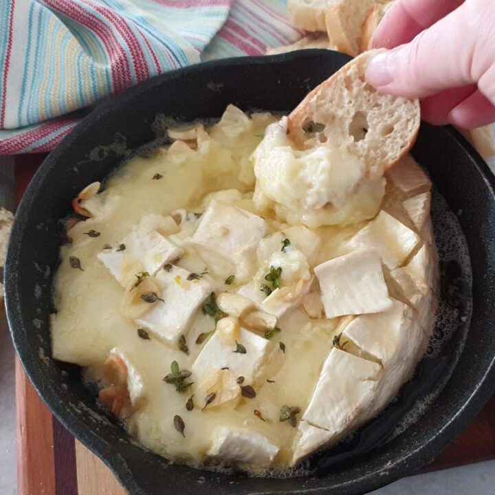 Garlic Butter Baked Brie That's the Perfect Appetizer - Savored Sips