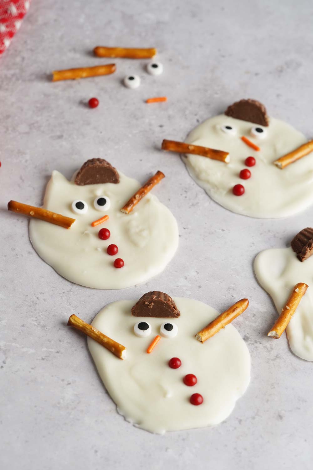 melted white chocolate snowmen