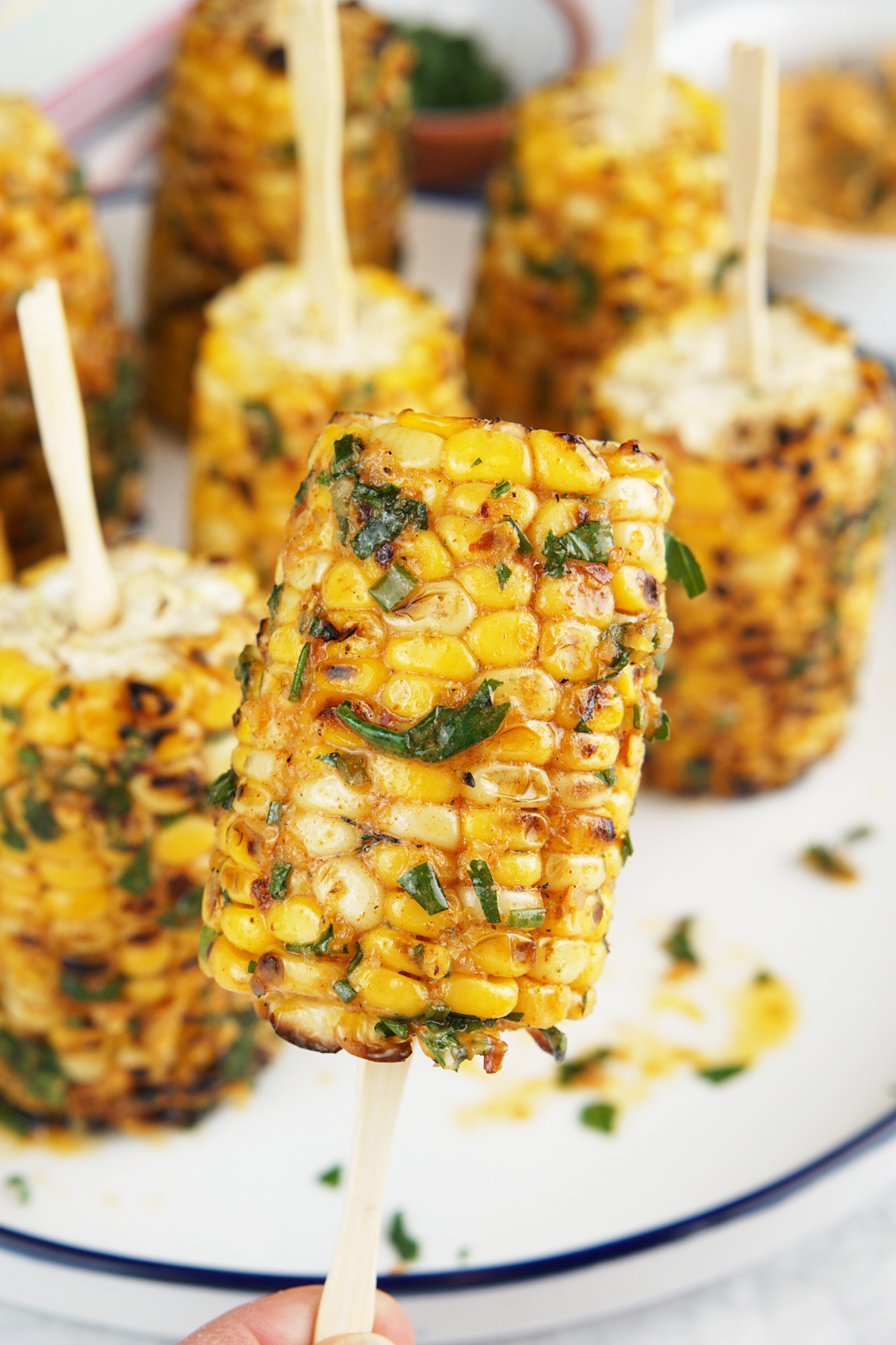 Corn lollipops with cowboy butter