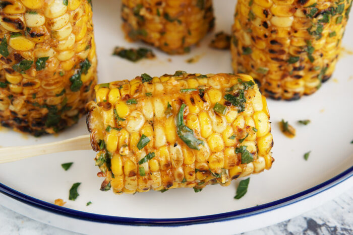 Corn lollipops with cowboy butter