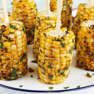 Corn lollipops with cowboy butter