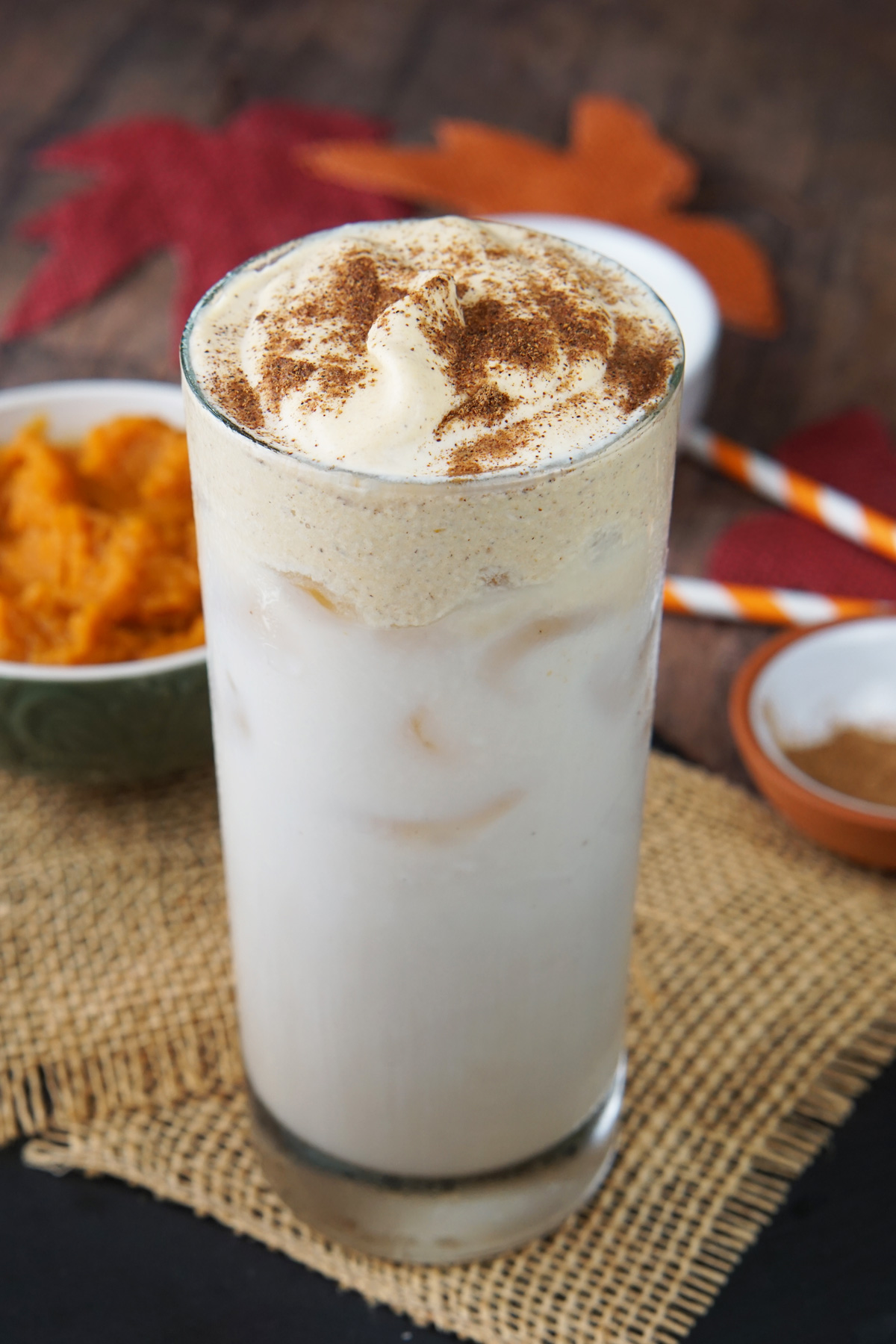 Iced chai latte with pumpkin spice cream